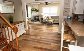 living room remodeled with wood-look flooring