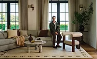 Nate Berkus and Rugs USA.jpg Nate Berkus in a living roon with a rug