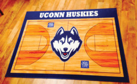 UConn Huskies mascot on digitally-printed carpet