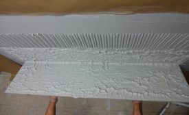 comb mortar parallel to short side of tile