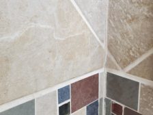 cracked grout in a shower corner