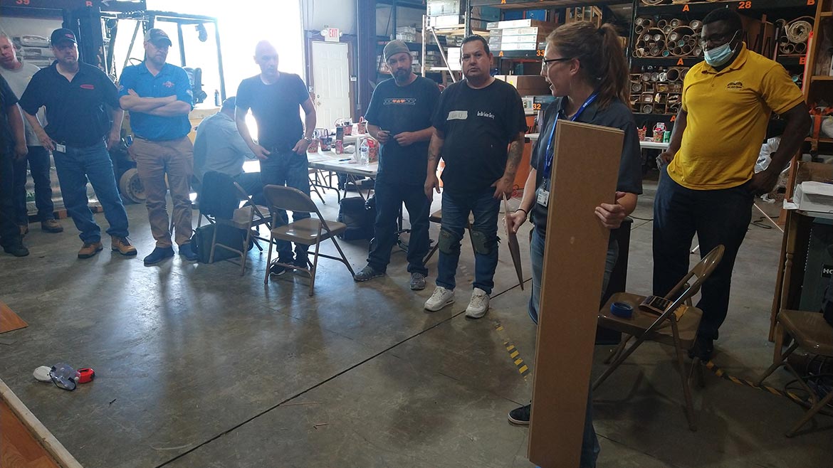 Jen Zurn teaching a CFI hardwood/laminate/LVP certification at Eagle Floorcovering Supplies