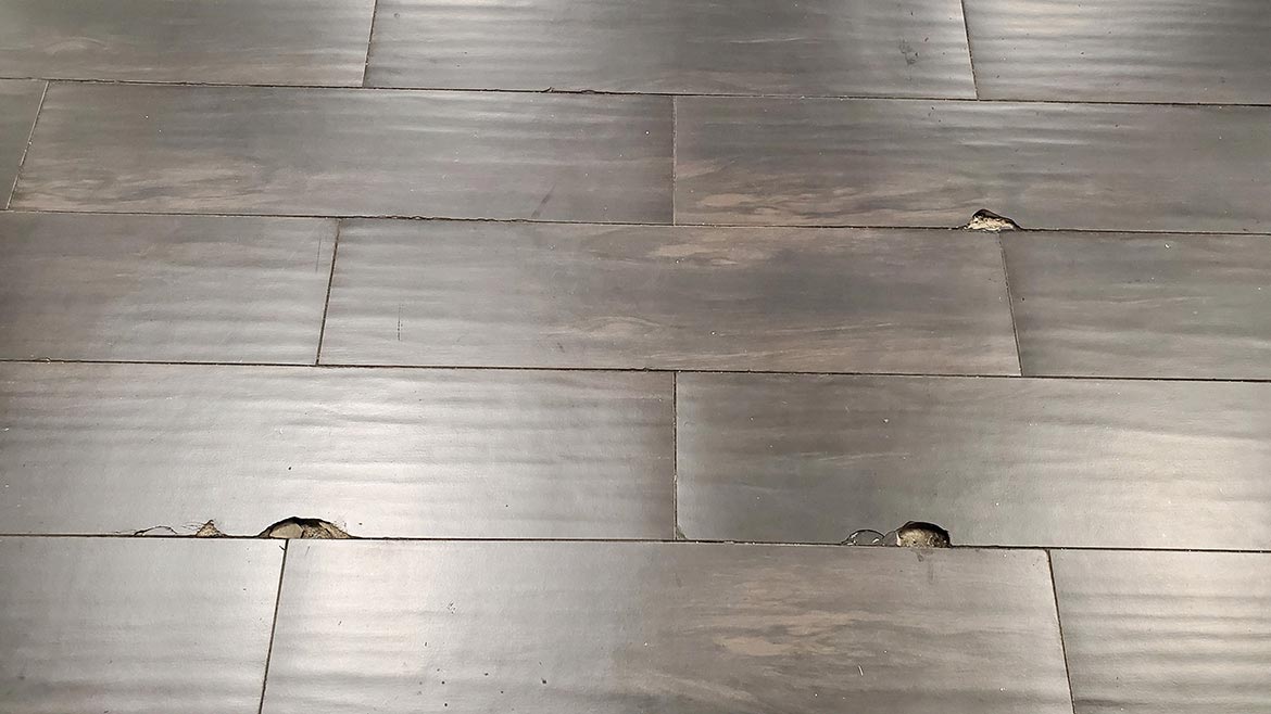 poor installation practices result in cracked floor tile