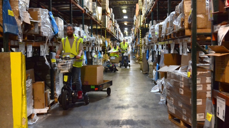 NAEIR warehouse filled with gifts in kind donations.jpg