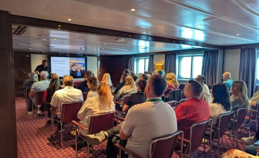retailers in a conference setting on a cruise ship