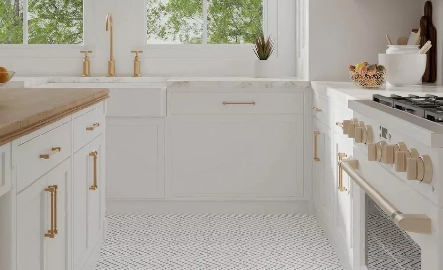 kitchen with white cabinets and gold hardware