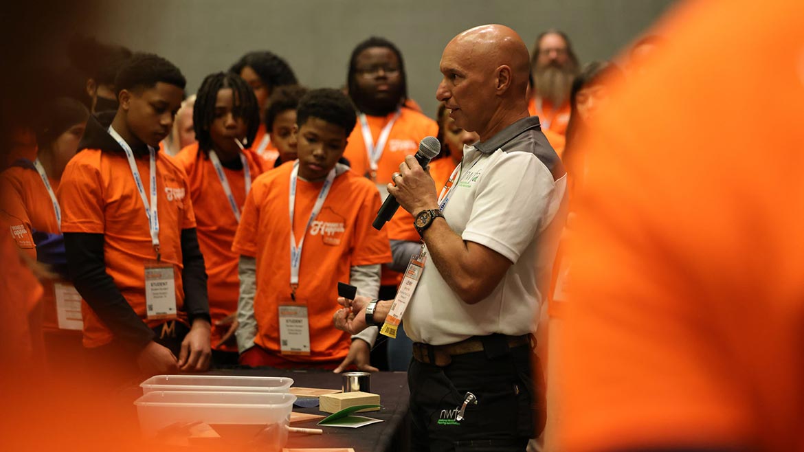 Lenny Hall walks students through project