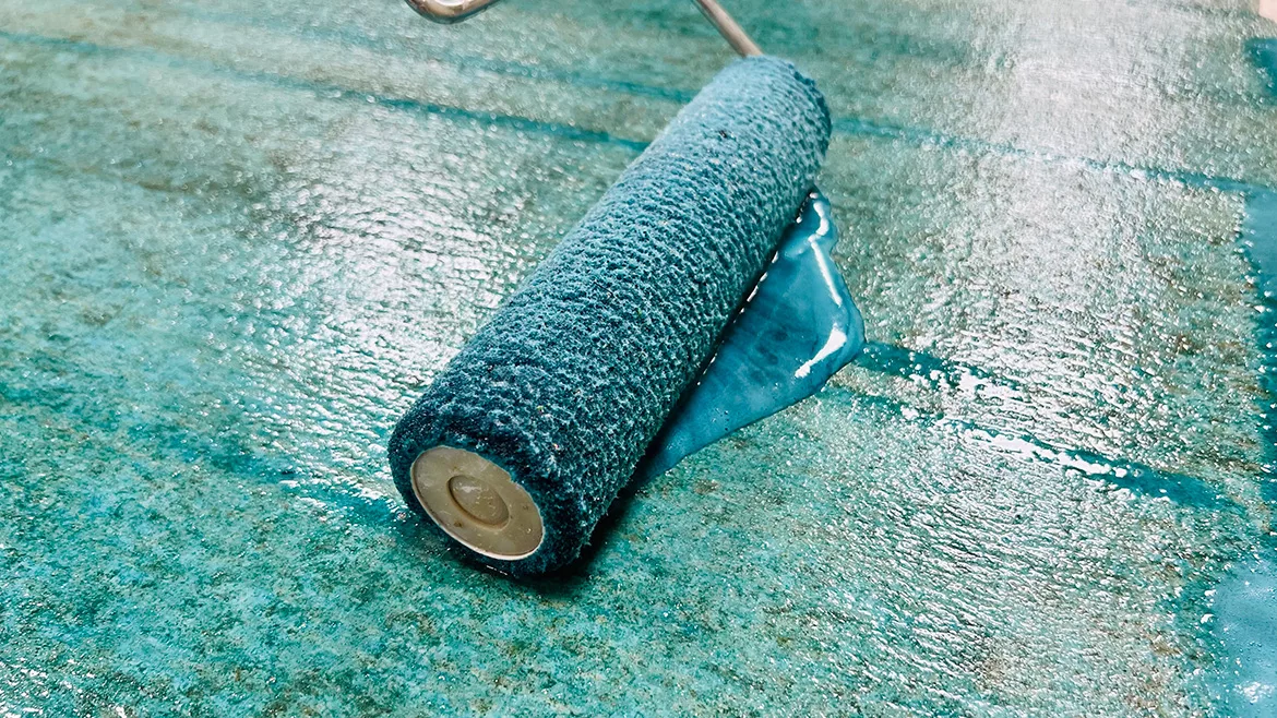 Rolling on moisture barrier with nap roller