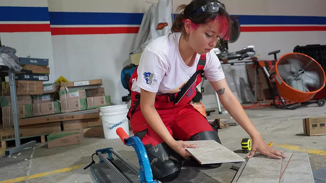 Kierstain Chavez cutting tile