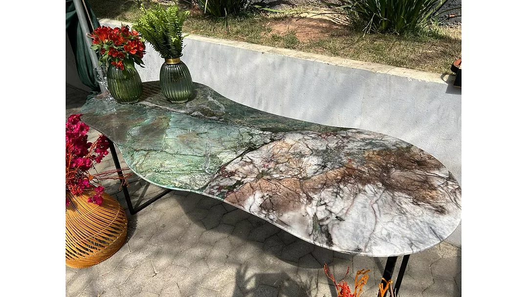 Capital Granites & Marbles Green and earth tones as table
