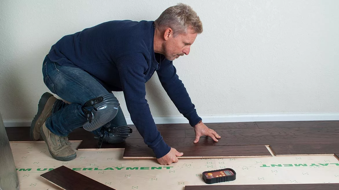 using a precision moisture meter to test hardwood flooring