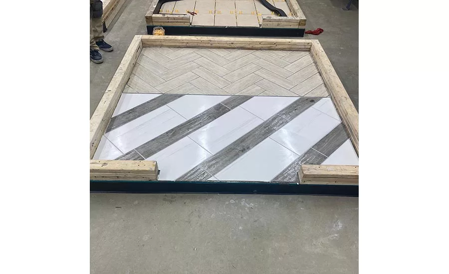 Charity’s completed tile installation