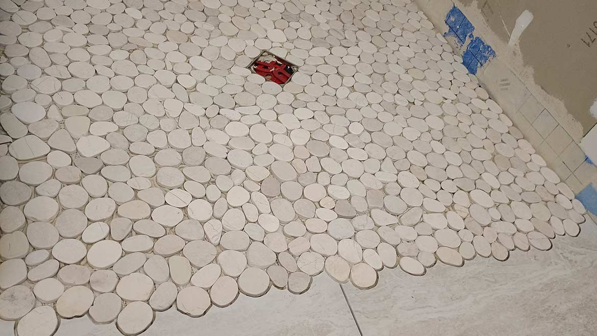 Pebble tile scribed into the field tile